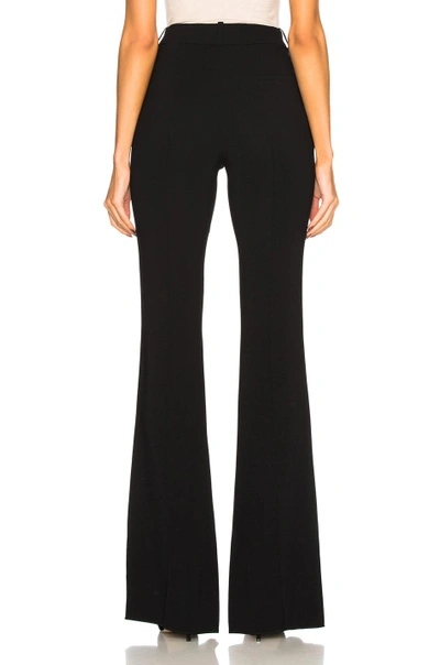 Shop Victoria Beckham Flared Trousers In Black