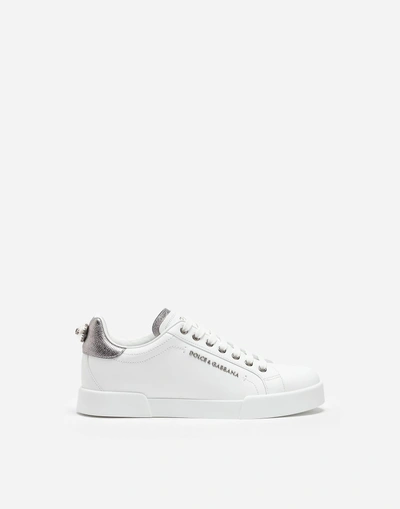 Shop Dolce & Gabbana Leather Portofino Sneakers With Logo Bead In White/silver