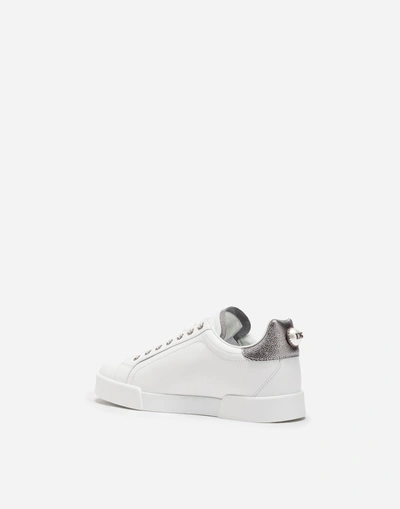 Shop Dolce & Gabbana Leather Portofino Sneakers With Logo Bead In White/silver