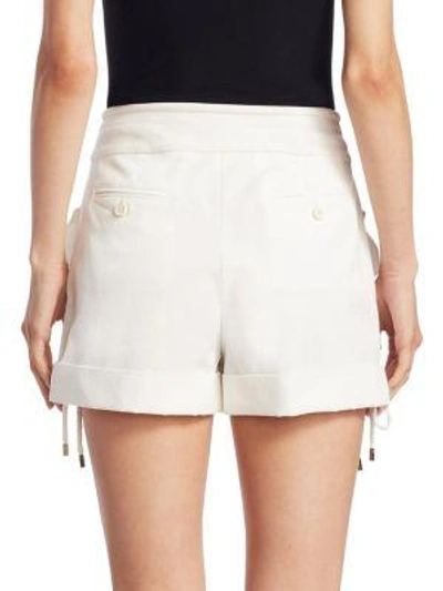 Shop Carven High-rise Poplin Ruffle Shorts In Antique White