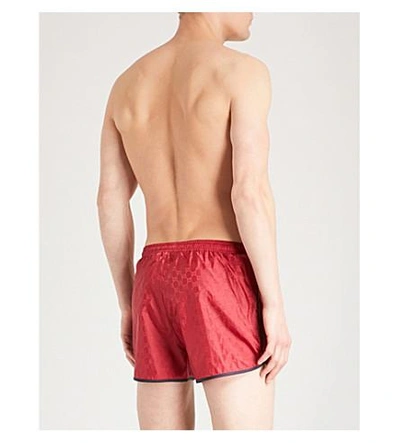 Shop Gucci Bee-embellished Swim Shorts In Red