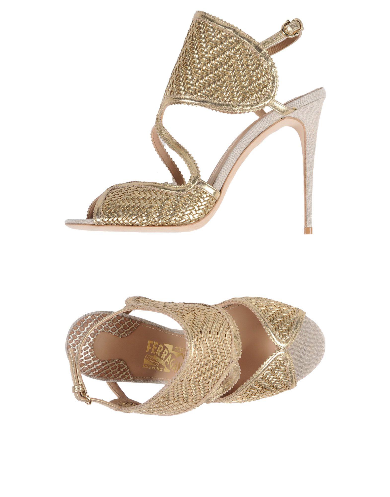black and gold ferragamo slides