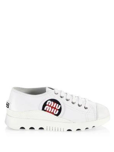 Shop Miu Miu Patch Leather Sneakers In White