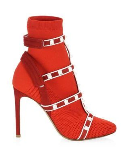 Shop Valentino Rockstud Sock Booties In Red