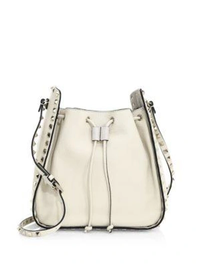 Shop Valentino Rockstud Leather Bucket Bag In Ivory