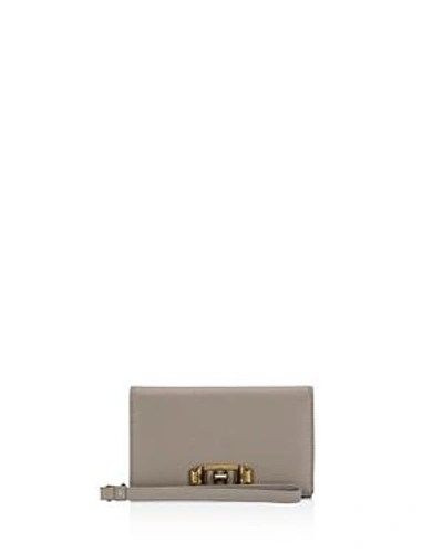 Shop Rebecca Minkoff Love Lock Iphone 7 & Iphone 7 Plus Leather Wristlet In Taupe/gold