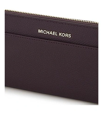 Shop Michael Michael Kors Mercer Continental Leather Wallet In Damson