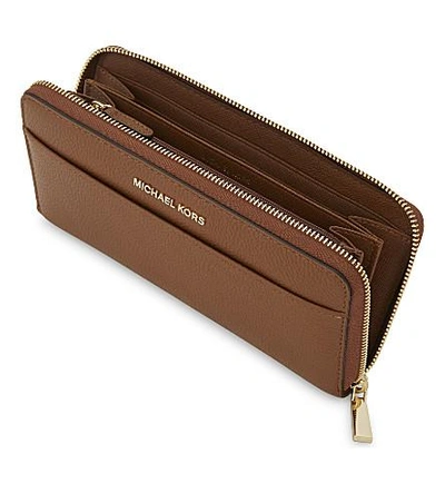 Shop Michael Michael Kors Mercer Continental Leather Wallet In Luggage