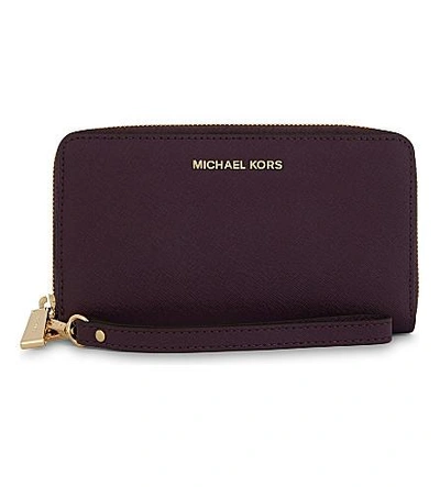 Shop Michael Michael Kors Jet Set Travel Large Leather Phone Wallet In Damson