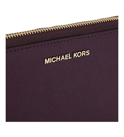 Shop Michael Michael Kors Jet Set Travel Large Leather Phone Wallet In Damson