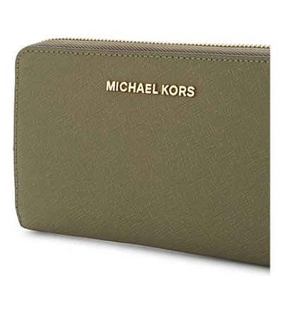 Shop Michael Michael Kors Leather Wristlet In Olive