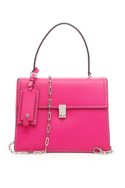 Shop Valentino Single Handle Bag In Fuxia