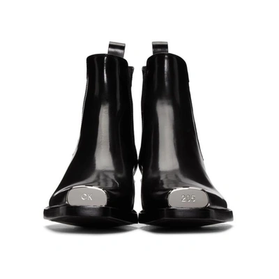 Calvin klein steel sales toe boots