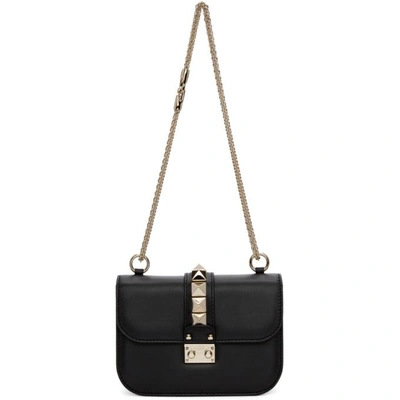 Shop Valentino Black  Garavani Small Lock Bag