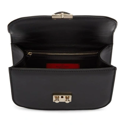 Shop Valentino Black  Garavani Small Lock Bag