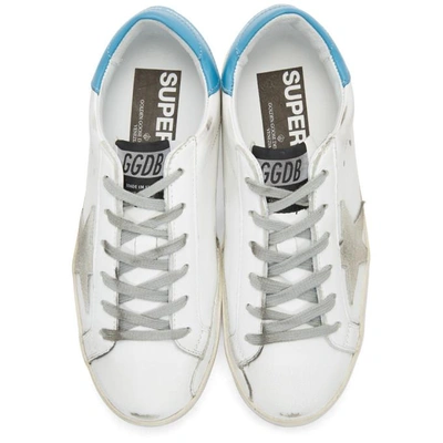 Shop Golden Goose White And Blue Superstar Sneakers In White-blue-