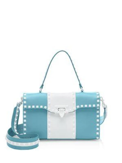 Shop Valentino Studded Leather Crossbody Bag In Blue