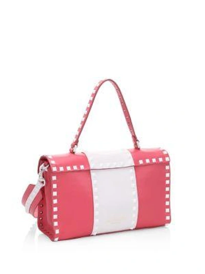 Shop Valentino Studded Leather Crossbody Bag In Pink