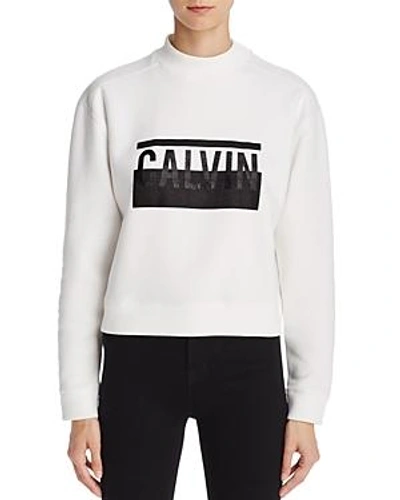 Shop Calvin Klein Jeans Est.1978 Mock Neck Cropped Logo Sweatshirt In Standard White