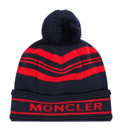 Shop Moncler Knitted Bobble Hat In Blue