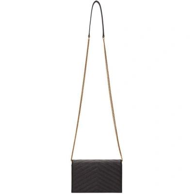 Shop Saint Laurent Black Quilted Monogram Envelope Chain Wallet Bag