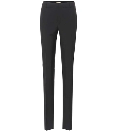 Shop Saint Laurent Wool Mid-rise Trousers In Black