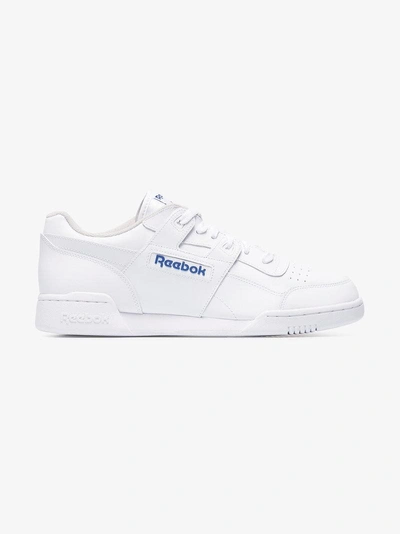 Shop Reebok Workout Plus Low-top Sneakers In White