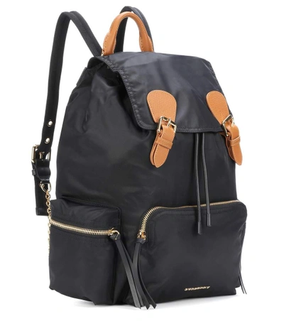 Shop Burberry The Large Leather-trimmed Backpack In Black