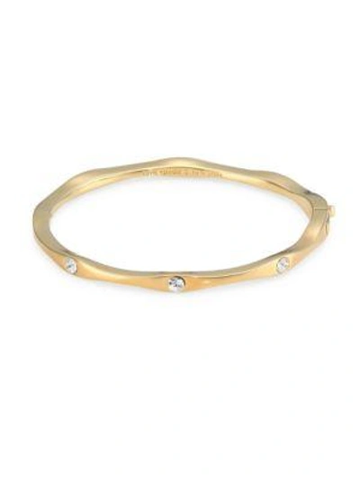 Shop Kate Spade Heavy Metals Wave Bangle In Gold