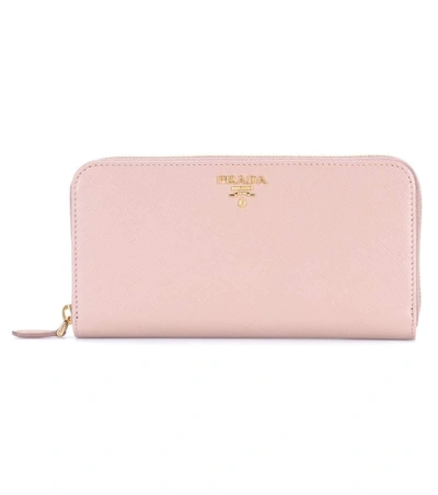 Shop Prada Saffiano Leather Zip-around Wallet In Pink