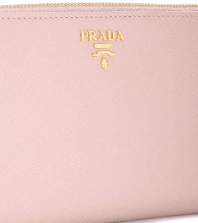 Shop Prada Saffiano Leather Zip-around Wallet In Pink