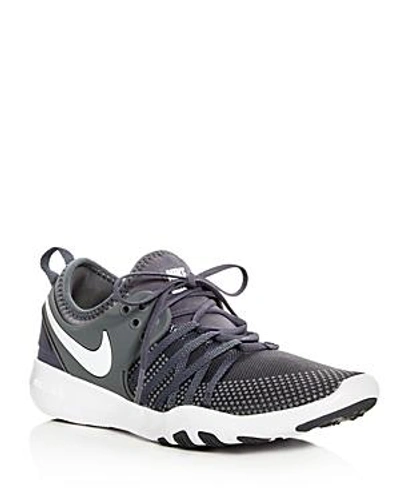 Shop Nike Women's Free Tr 7 Lace Up Sneakers In Dark Gray/white