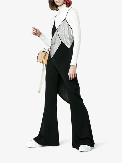 Shop Beaufille High Waisted Flared Trousers In Black