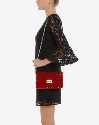 Shop Valentino Garavani Velvet Rockstud Spike Crossbody Clutch In Rosso