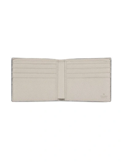 Shop Gucci Print Leather Bi-fold Wallet In White