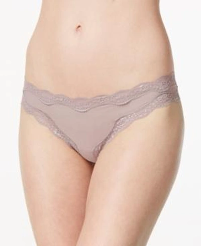 Shop Calvin Klein Coquette Lace Thong Qd3536 In Violet Dust