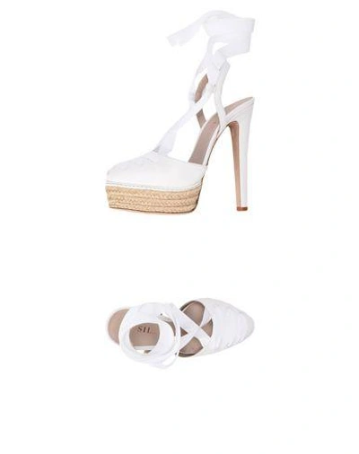 Shop Le Silla Sandals In White