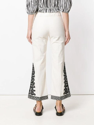 Shop Tory Burch Embroidered Flared Trousers In New Ivory 104