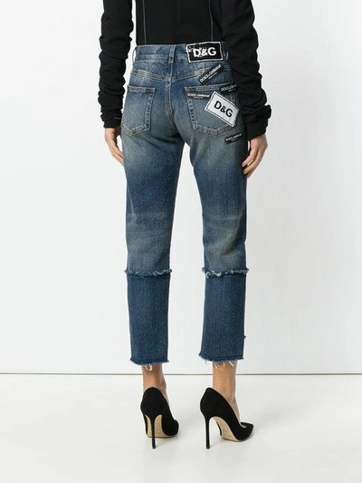 cropped distressed double denim jeans