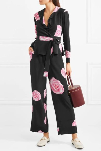 Shop Ganni Ruffled Floral-print Silk Crepe De Chine Wrap Top In Black