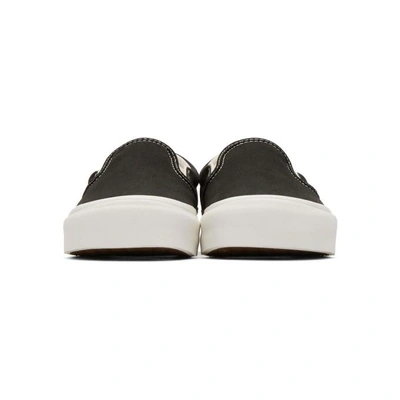 Shop Vans Black Og Classic Slip-on Sneakers In Blk