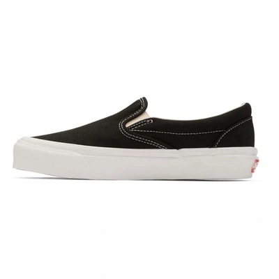 Shop Vans Black Og Classic Slip-on Sneakers In Blk