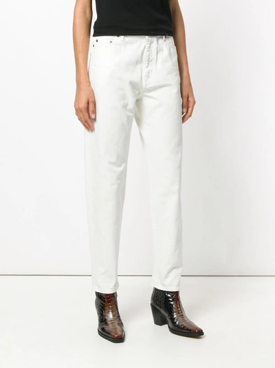 Shop Saint Laurent Tapered Leg Jeans