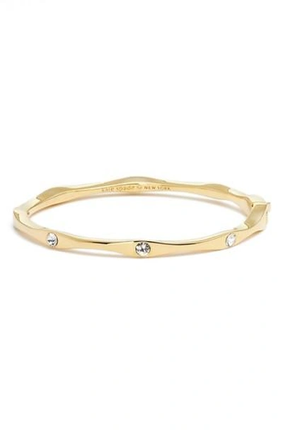 Shop Kate Spade Heavy Metals Wave Bangle In Gold