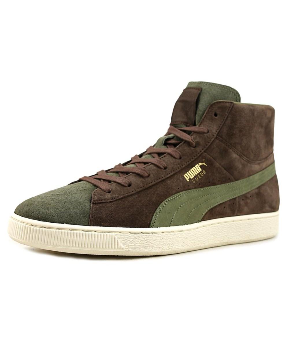 green suede pumas men's