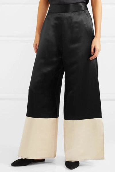 Shop Beaufille Sina Two-tone Satin Wide-leg Pants In Black