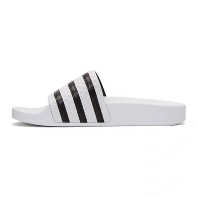 Shop Adidas Originals White Striped Adilette Slides