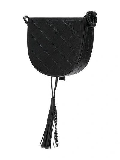Shop Saint Laurent Decorative Embossed Saddle Bag - Black