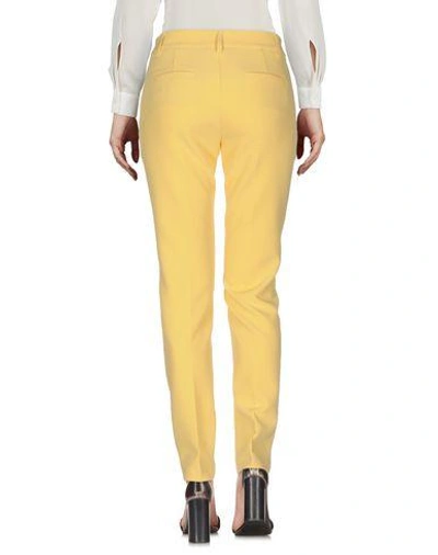 Shop Atos Lombardini Pants In Yellow