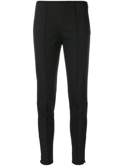 Shop Prada Paneled Skinny Fit Trousers In Black